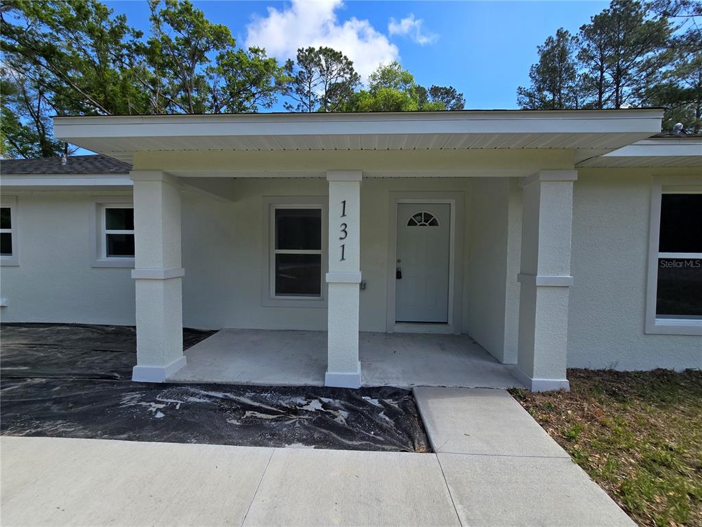 131 Fisher Road Ocklawaha, FL 32179 - Photo 11 of 42 a front view of a house