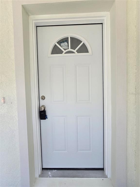 131 Fisher Road Ocklawaha, FL 32179 - Photo 14 of 42 a picture of door of a house