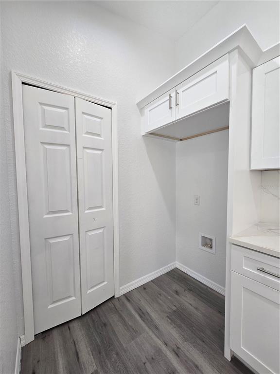 131 Fisher Road Ocklawaha, FL 32179 - Photo 17 of 41 a view of an empty room with wooden floor and closet