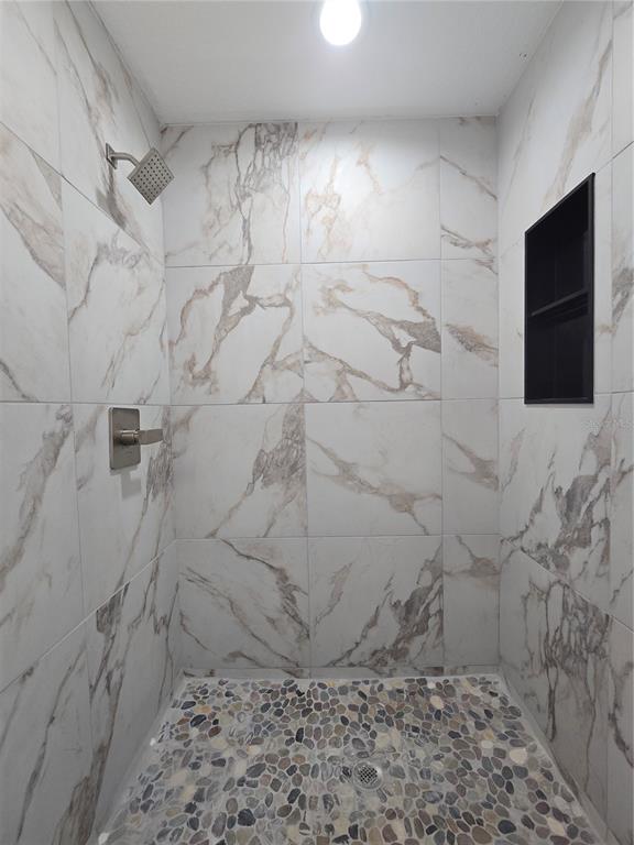 131 Fisher Road Ocklawaha, FL 32179 - Photo 22 of 41 a bathroom with a shower