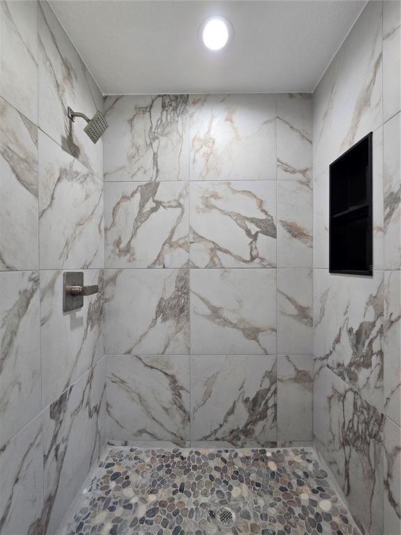 131 Fisher Road Ocklawaha, FL 32179 - Photo 27 of 42 a bathroom with a shower