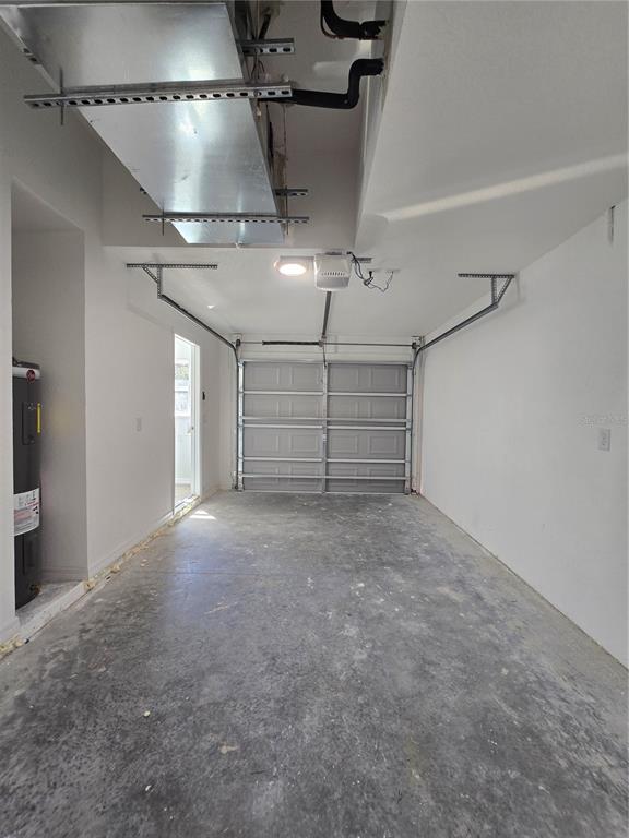 131 Fisher Road Ocklawaha, FL 32179 - Photo 40 of 41 a view of a garage