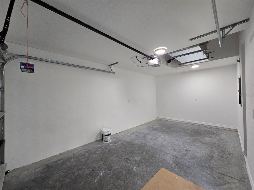 131 Fisher Road Ocklawaha, FL 32179 - Photo 41 of 42 a view of a room with racks on the wall