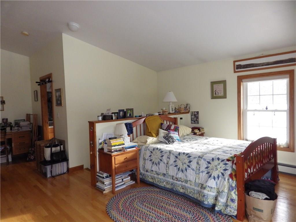 492 Belgrade Road Oakland, ME 04963 - Photo 25 of 32 Master bedroom with wood floors.