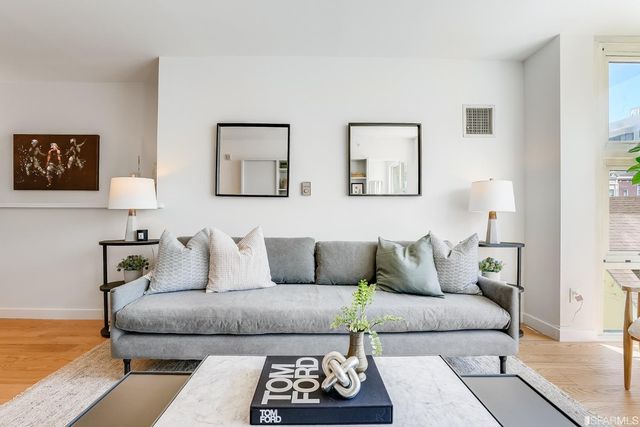 a living room with furniture and a couch