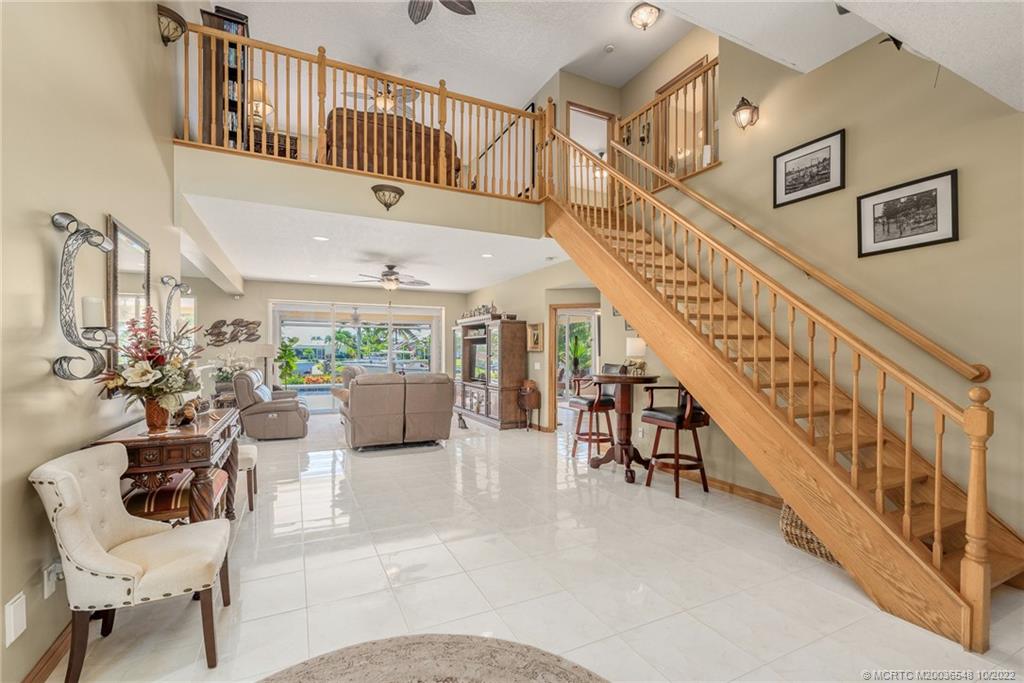 5854 Southeast Horseshoe Point Road Stuart, FL 34997 - Photo 14 of 56 a view of entryway and hall