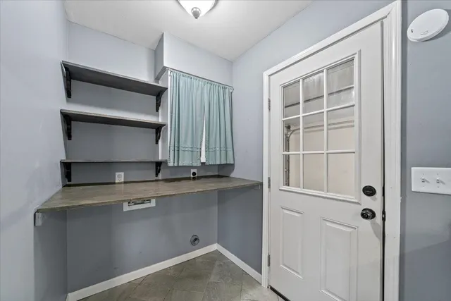 a room with storage and utility