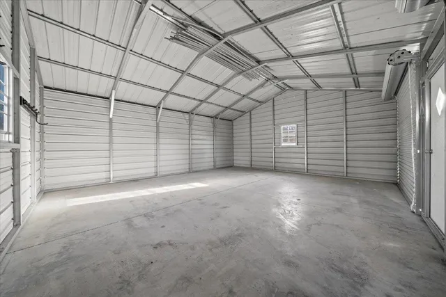 a view of a room with wooden walls