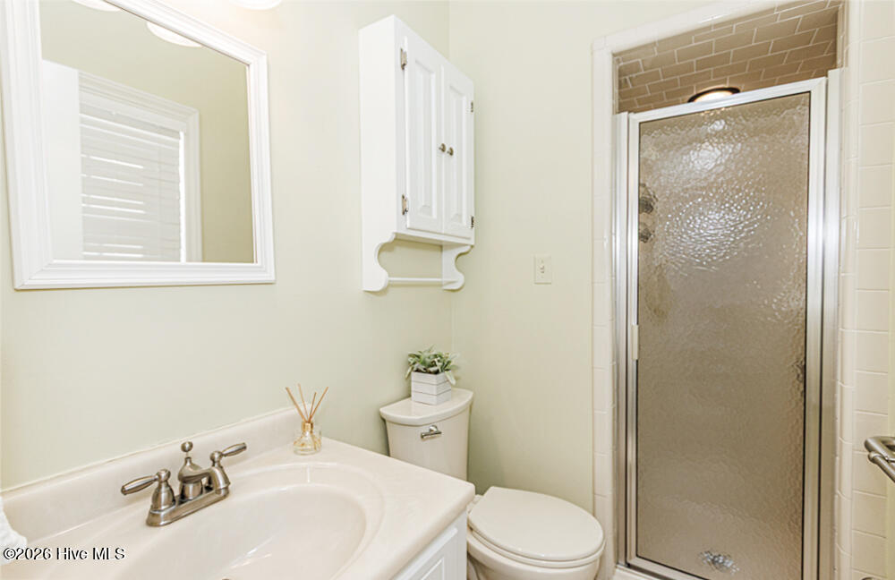 4016 Carybrook Road Rocky Mount, NC 27803 - Photo 8 of 15 Walk-in shower and tile flooring