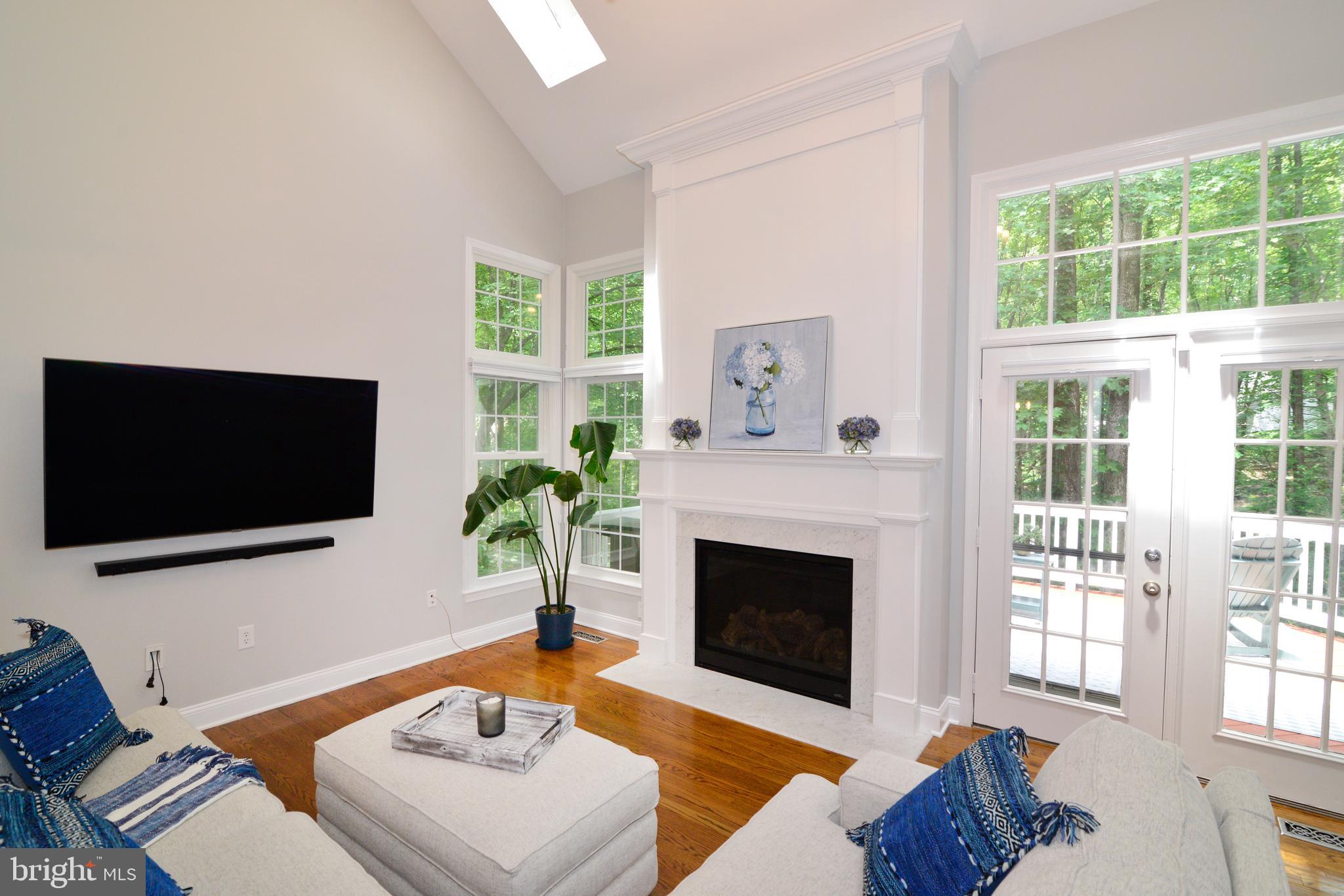 Open, Contemporary Feel w/2-Story Family Room.