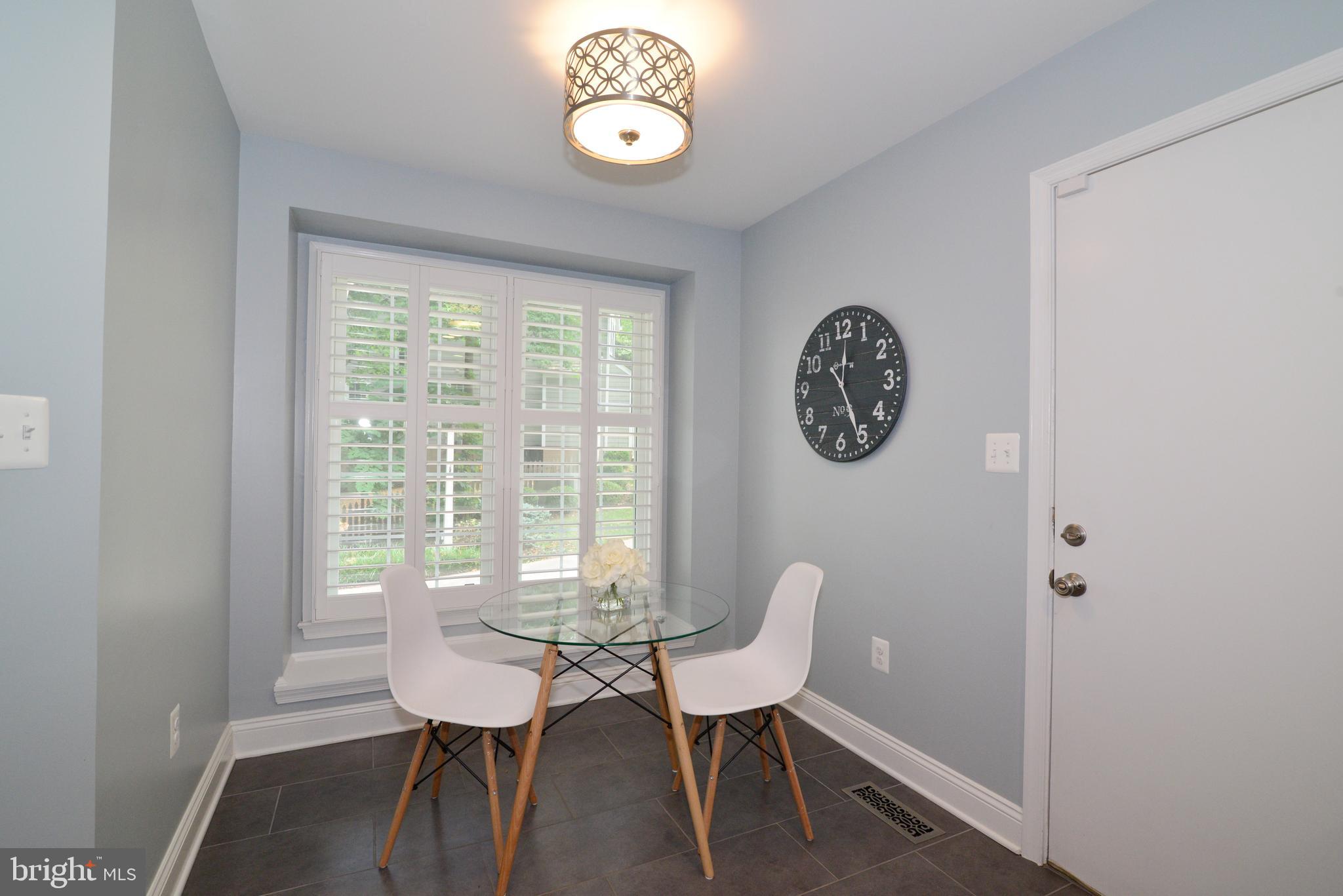 11633 Springhouse Place Reston, VA 20194 - Photo 12 of 42 Breakfast Room w/ Window Seat, Plantation Shutter