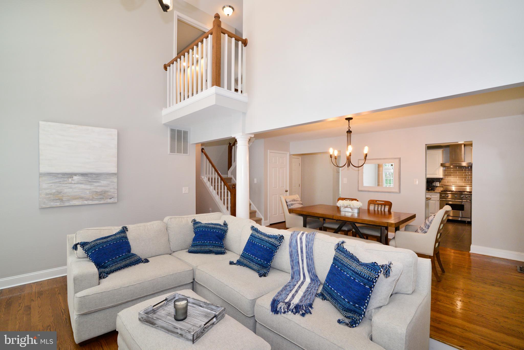 11633 Springhouse Place Reston, VA 20194 - Photo 3 of 42 Family Room, Upper Level Overlook, & Dining Room