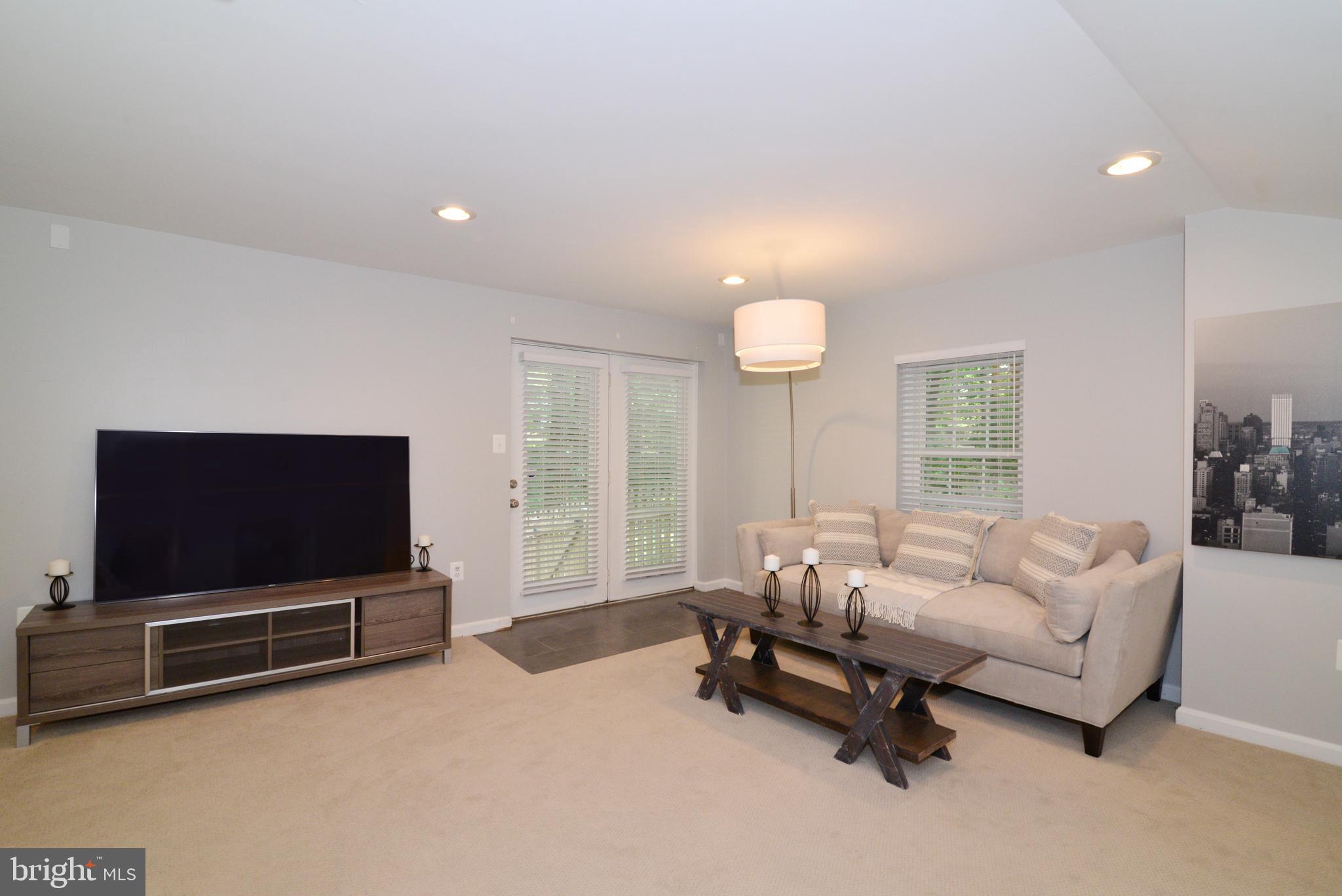 11633 Springhouse Place Reston, VA 20194 - Photo 32 of 42 Walk-Out Lower Level with French Door to Backyard.