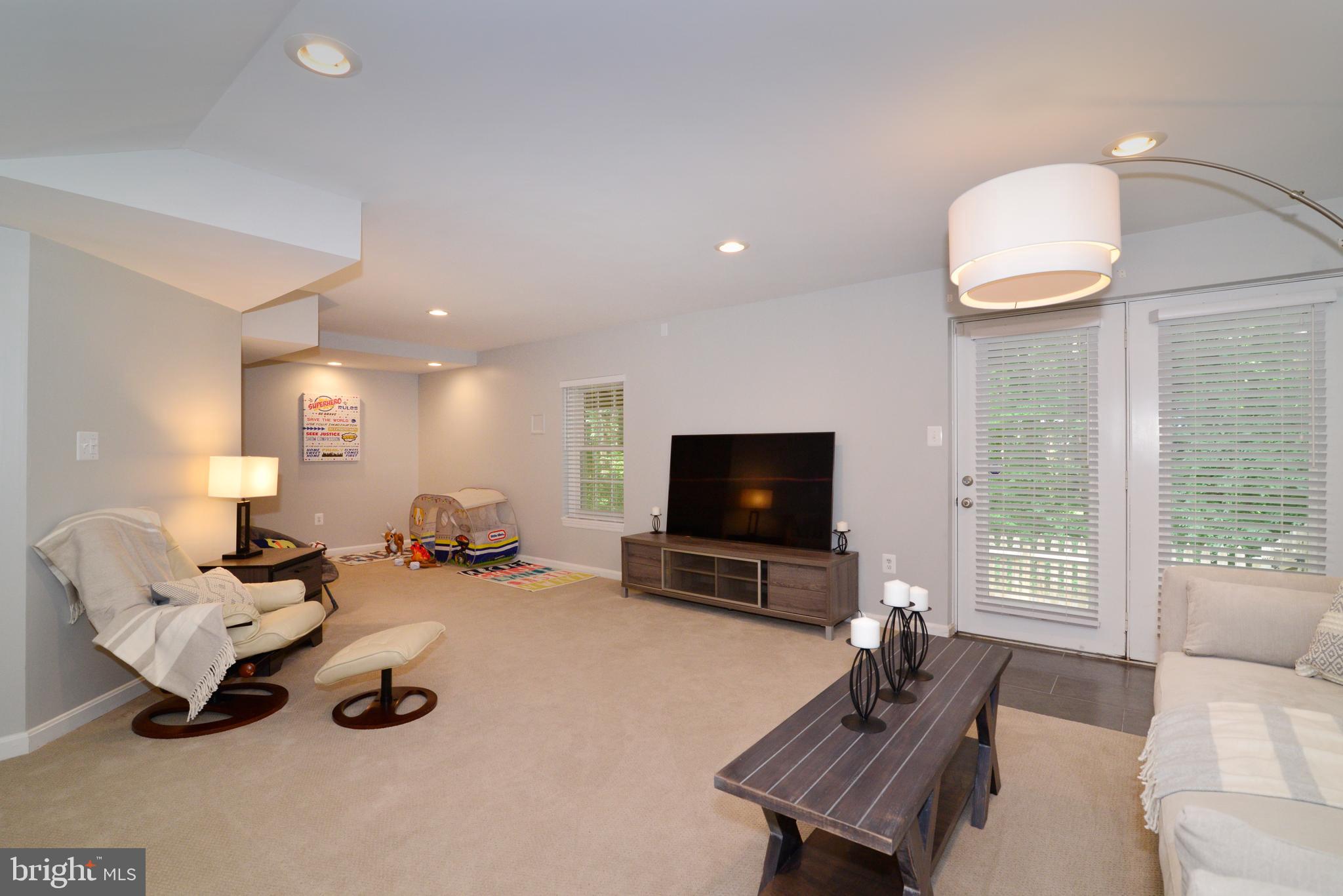 11633 Springhouse Place Reston, VA 20194 - Photo 33 of 42 Spacious Lower Level Recreation Room.