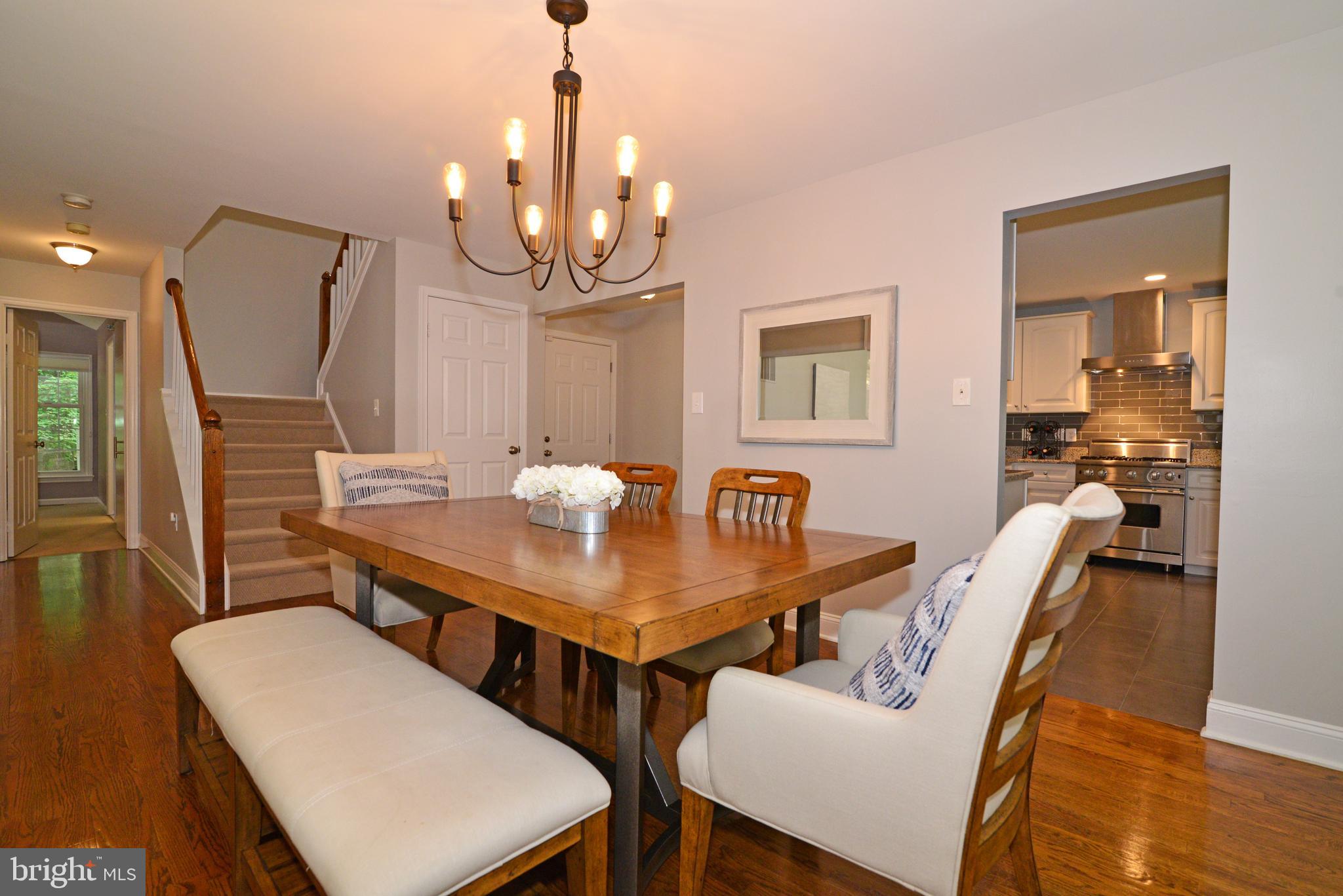 11633 Springhouse Place Reston, VA 20194 - Photo 7 of 42 Dining Room with View To Kitchen.