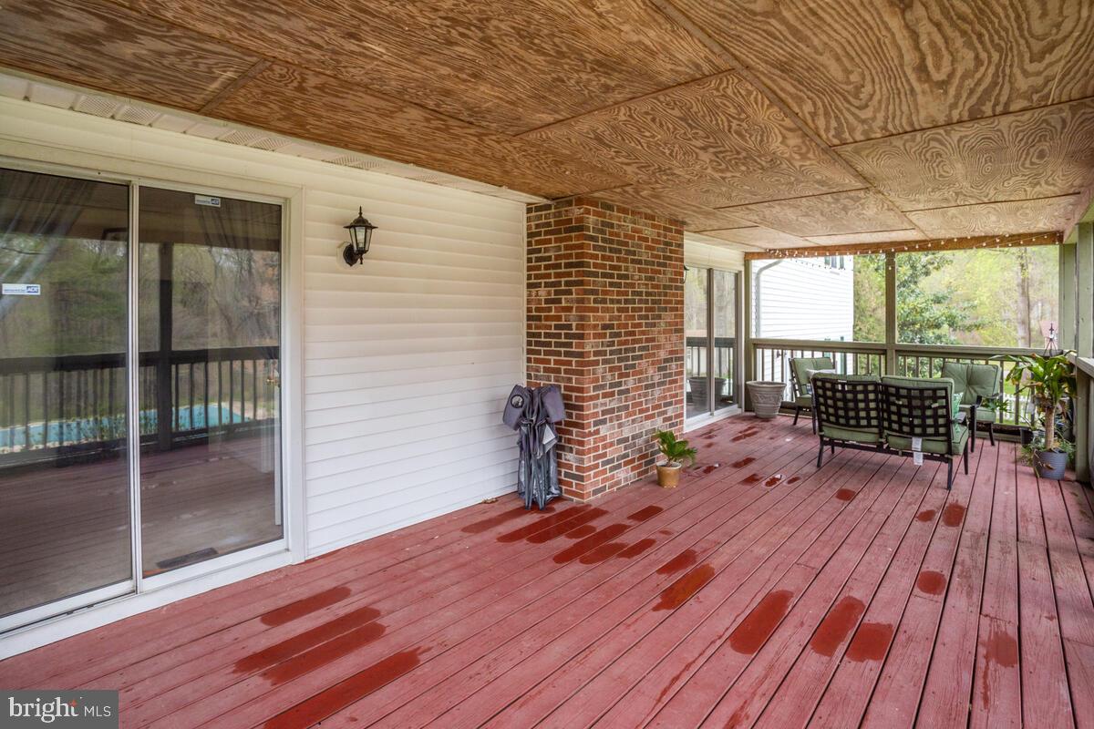 4320 Camp Kaufmann Road Huntingtown, MD 20639 - Photo 55 of 68 Screened deck on back