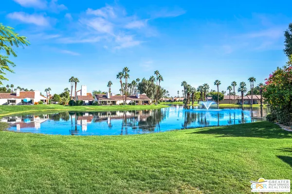 a view of swimming pool with outdoor space and seating
