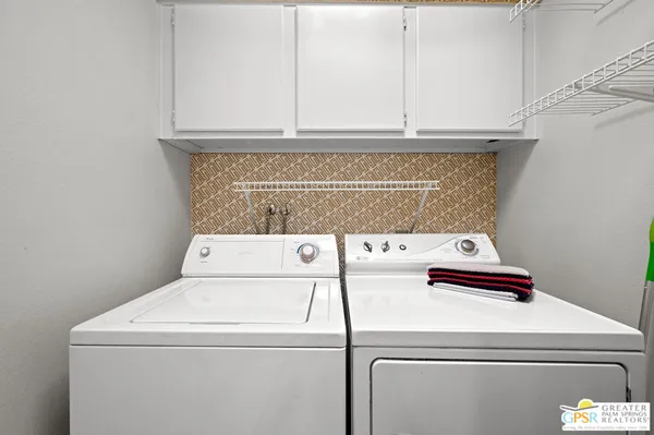 a close up view of washer and dryer