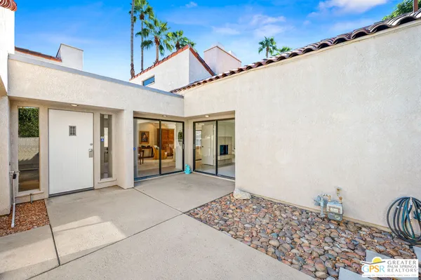 a view of a house with a patio