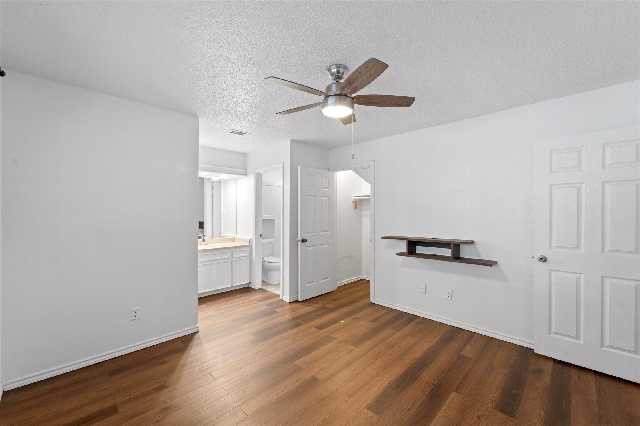 500 Hesters Crossing Road, Unit 209 Round Rock, TX 78681 - Photo 12 of 24 a view of empty room with wooden floor