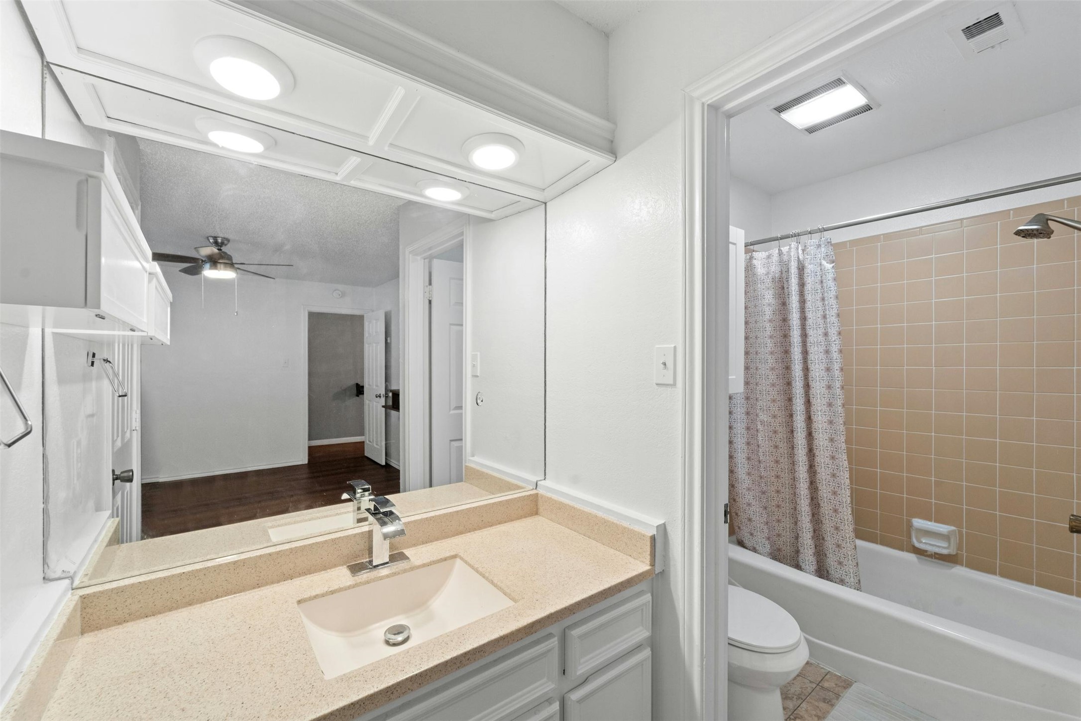 500 Hesters Crossing Road, Unit 209 Round Rock, TX 78681 - Photo 13 of 24 a bathroom with a sink vanity granite toilet tub and shower