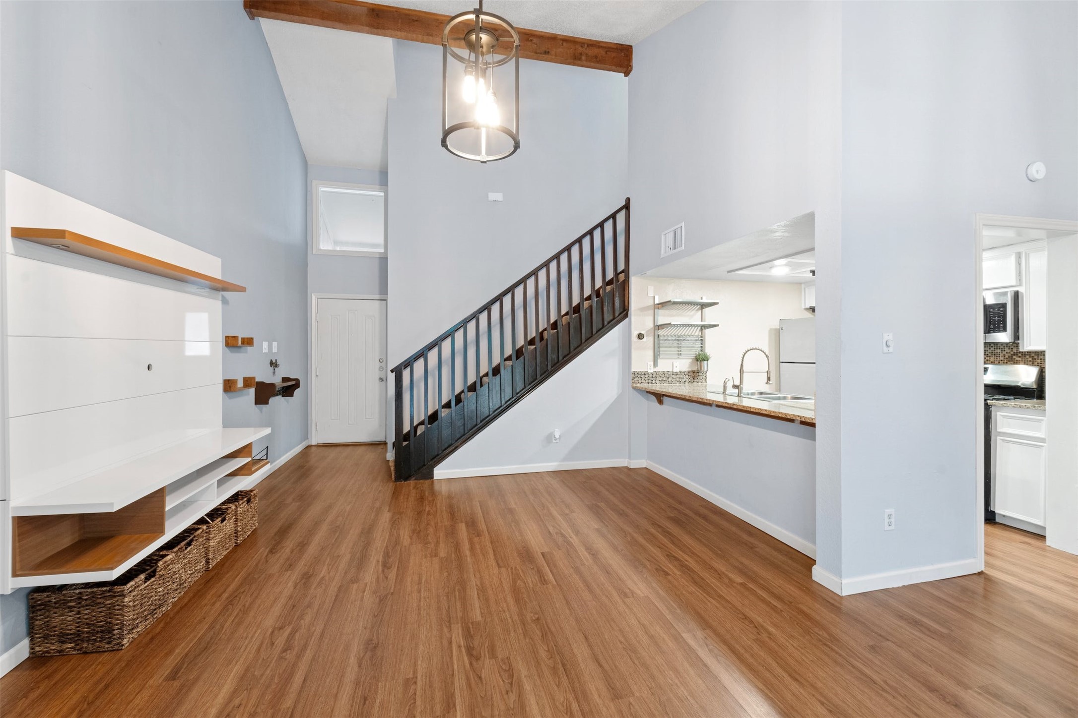 500 Hesters Crossing Road, Unit 209 Round Rock, TX 78681 - Photo 2 of 24 a view of a hallway with wooden floor