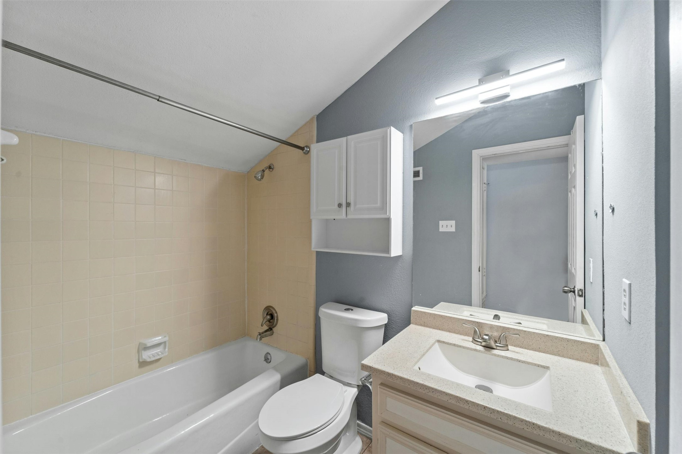 500 Hesters Crossing Road, Unit 209 Round Rock, TX 78681 - Photo 21 of 24 a bathroom with a sink toilet and shower