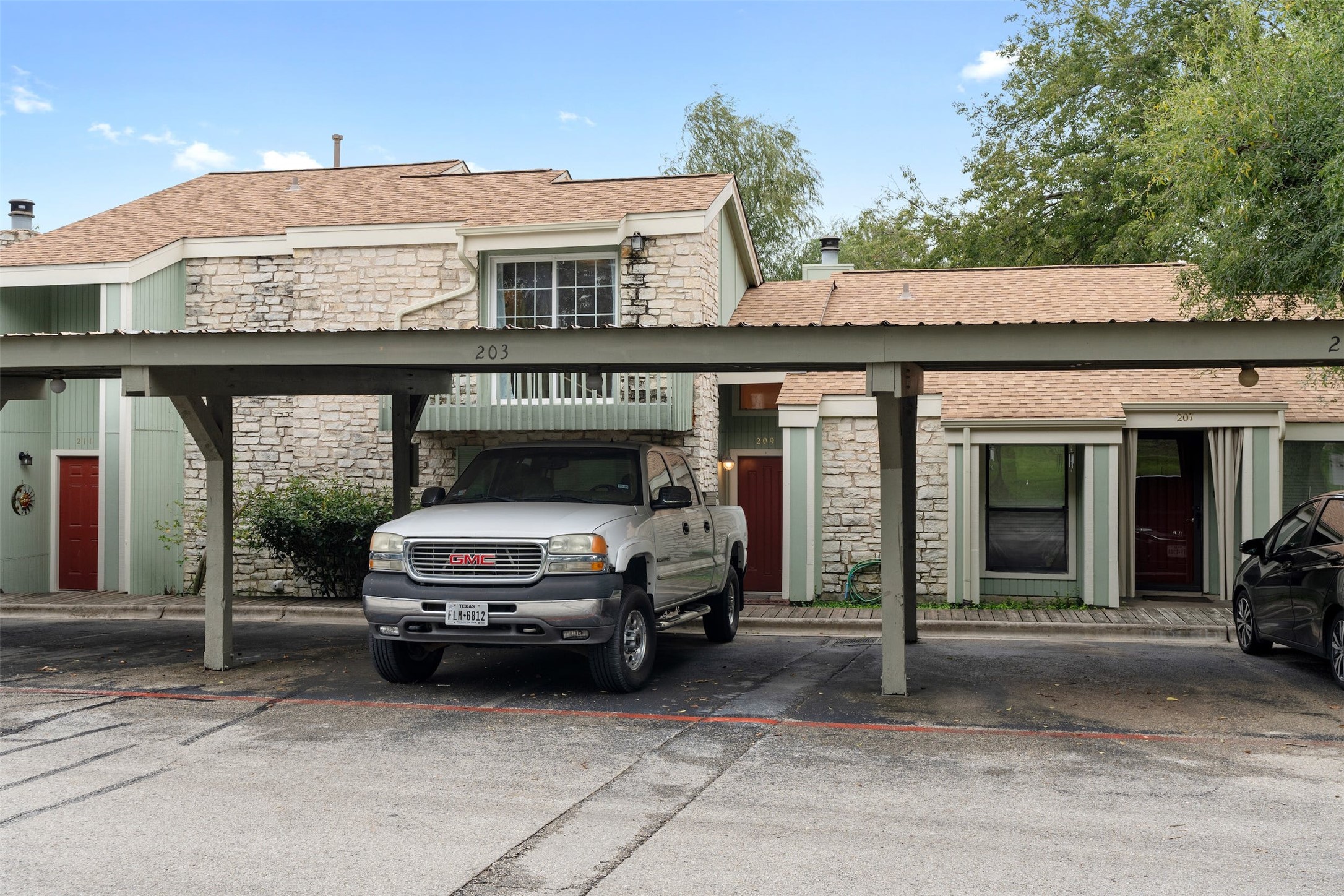 500 Hesters Crossing Road, Unit 209 Round Rock, TX 78681 - Photo 24 of 24 a car parked in front of a building