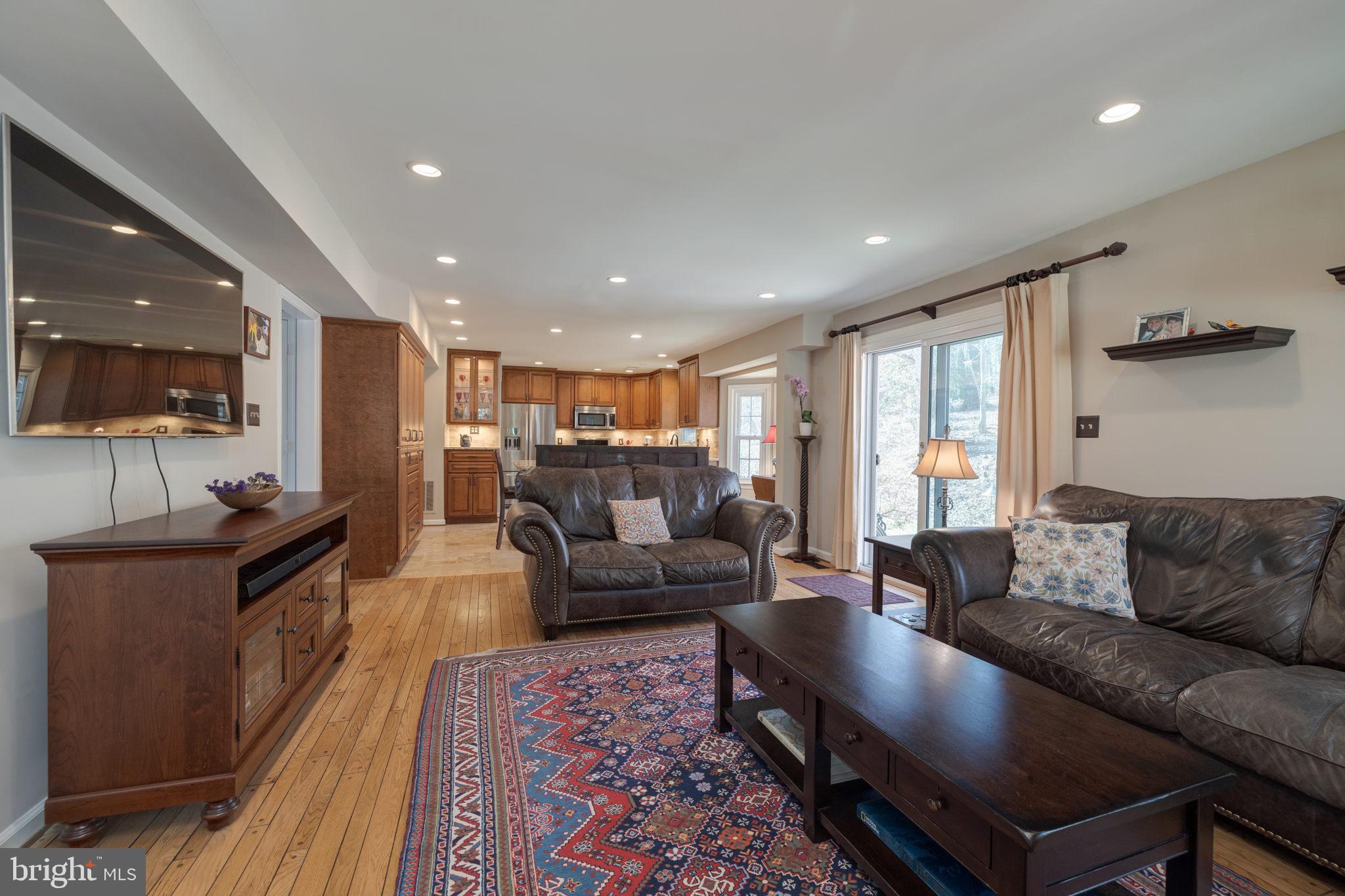 7736 Huntsman Boulevard Springfield, VA 22153 - Photo 21 of 70 Sunny family room w/ gas fireplace