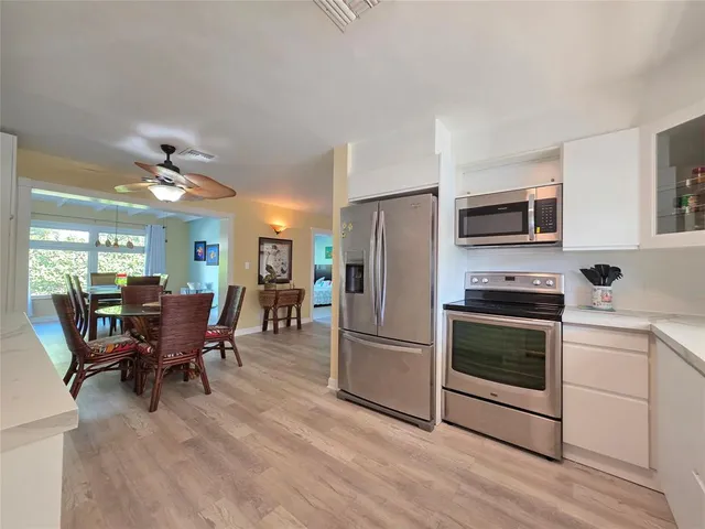 a bathroom with a toilet sink shower and mirror