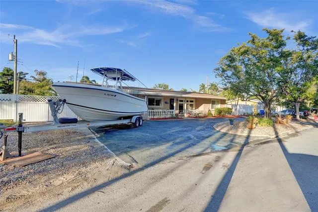 a living room with furniture window and wooden floor