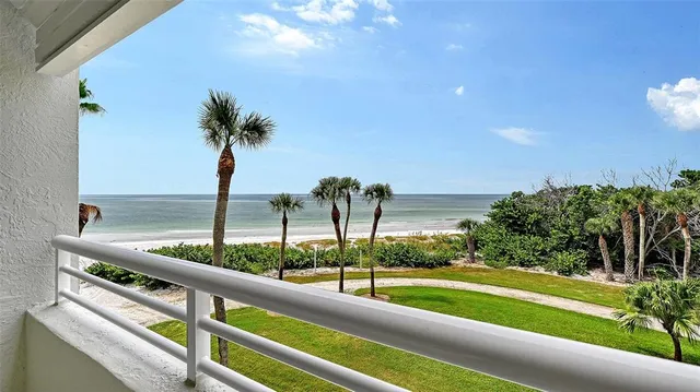 a view of swimming pool from a balcony