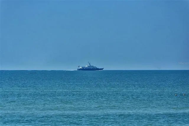 a view of a street with a house