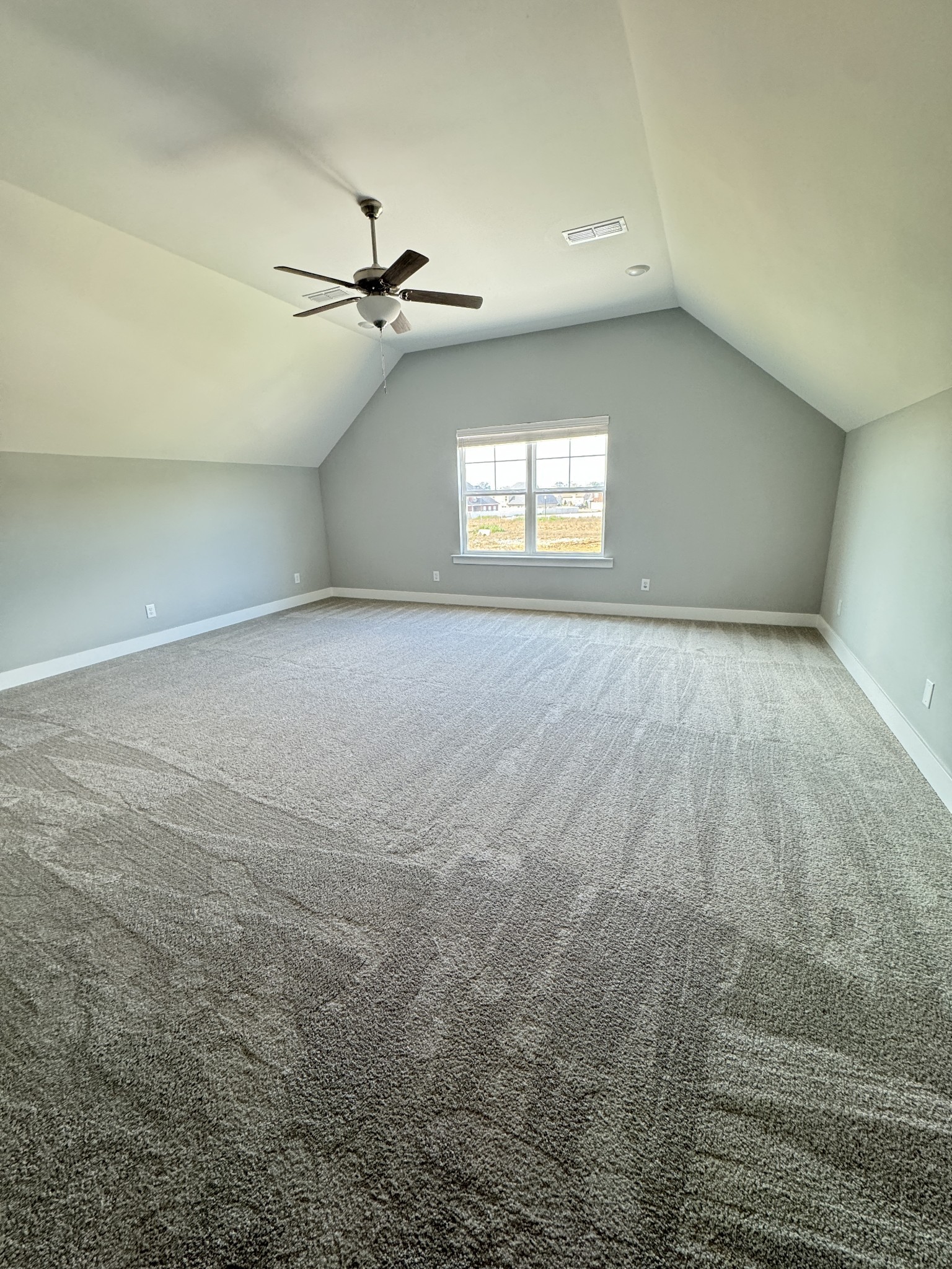5482 Rooker Road Smyrna, TN 37167 - Photo 15 of 30 an empty room with windows and ceiling fan view