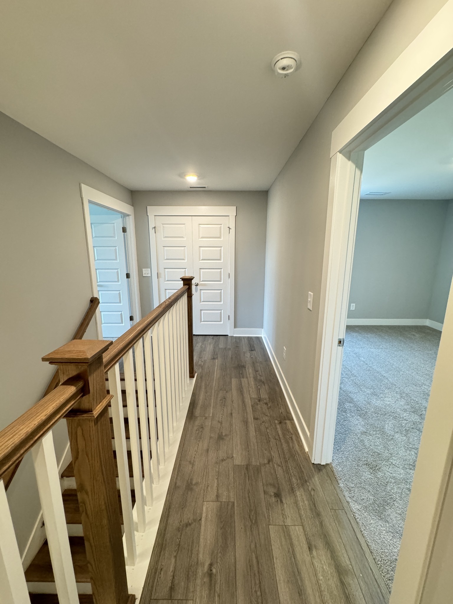 5482 Rooker Road Smyrna, TN 37167 - Photo 16 of 30 a view of a hallway view with wooden floor and staircase