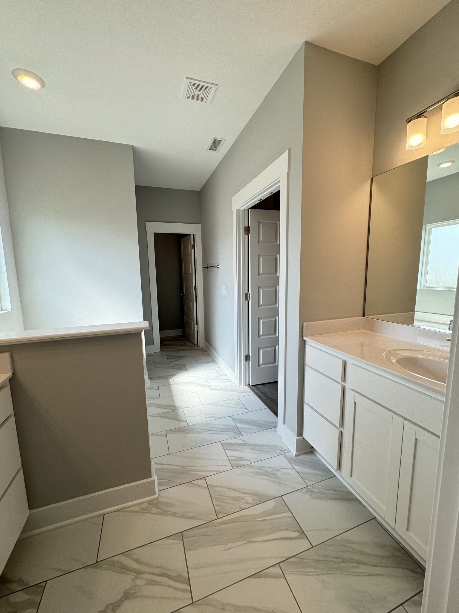 5482 Rooker Road Smyrna, TN 37167 - Photo 18 of 30 a bathroom with a sink and a mirror