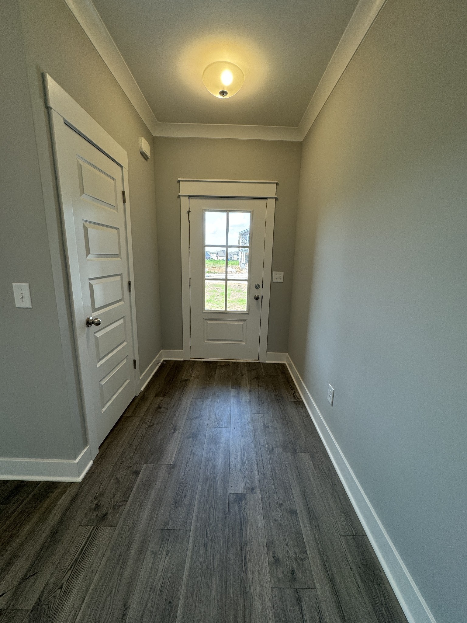 5482 Rooker Road Smyrna, TN 37167 - Photo 2 of 30 an empty room with wooden floor and window