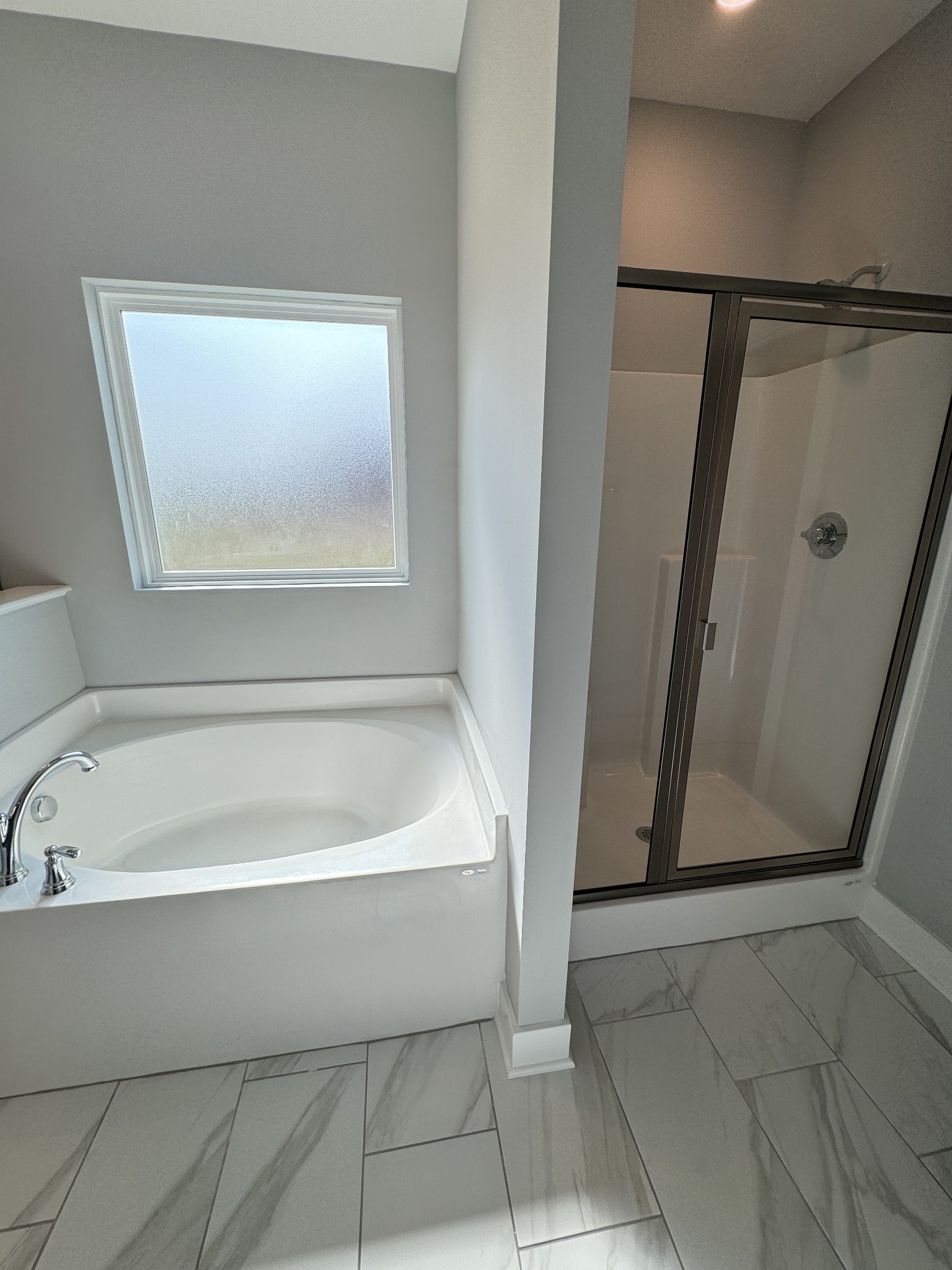 5482 Rooker Road Smyrna, TN 37167 - Photo 21 of 30 a bathroom with a bathtub