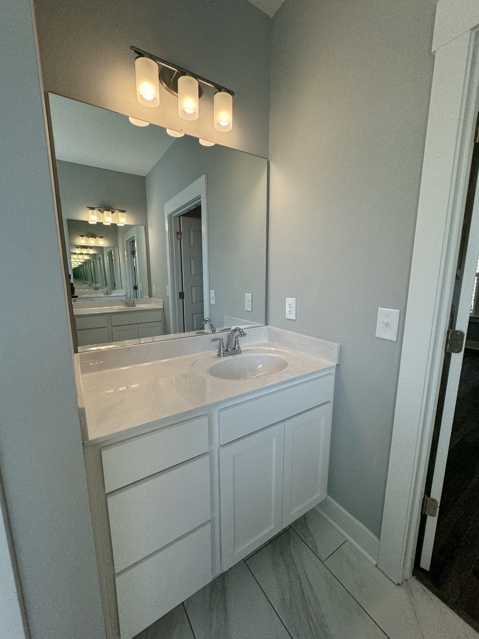 5482 Rooker Road Smyrna, TN 37167 - Photo 23 of 30 a bathroom with a sink and a mirror