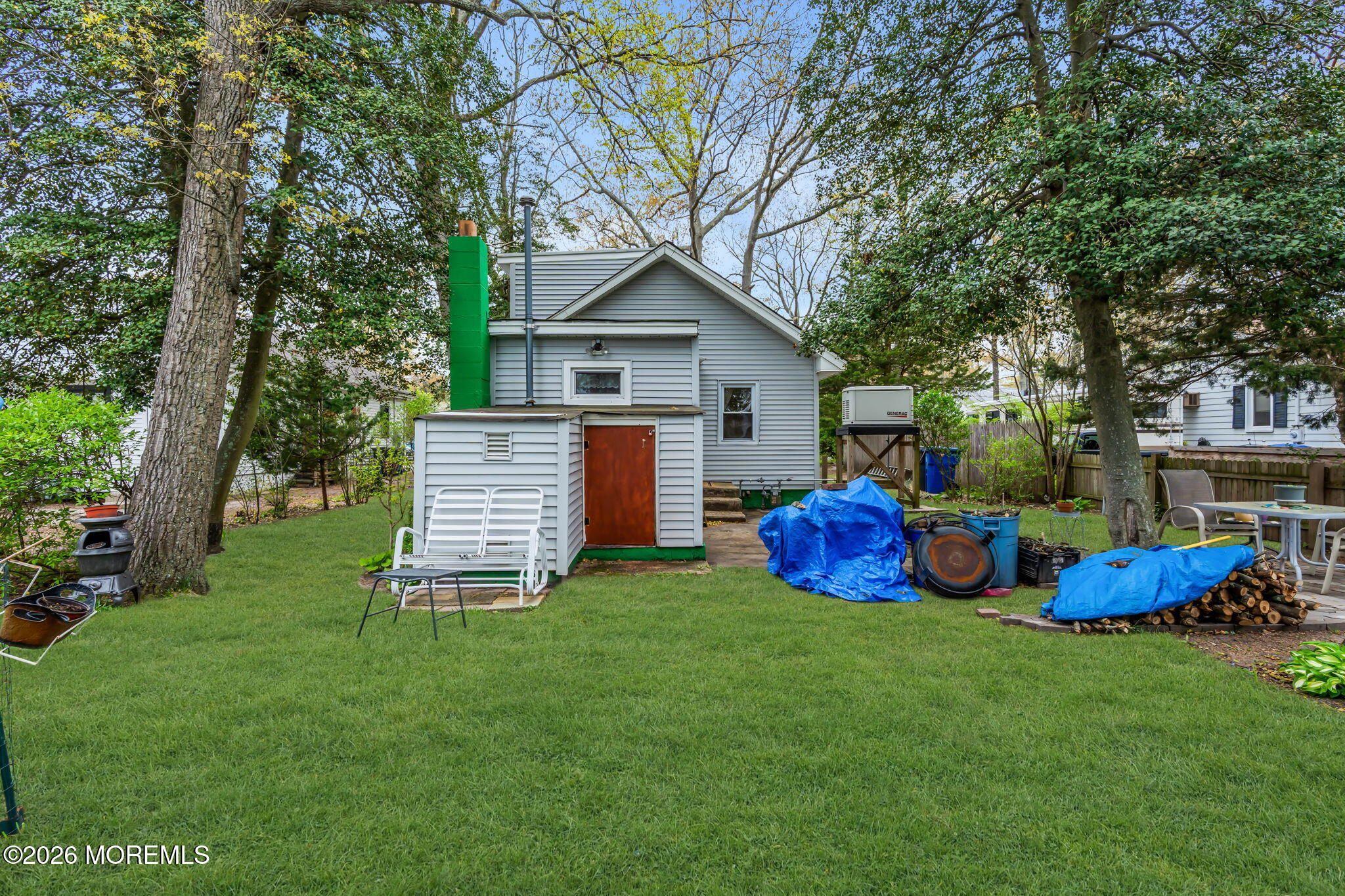 109 Martin Road Toms River, NJ 08753 - Photo 31 of 34 a view of a house with a yard and deck