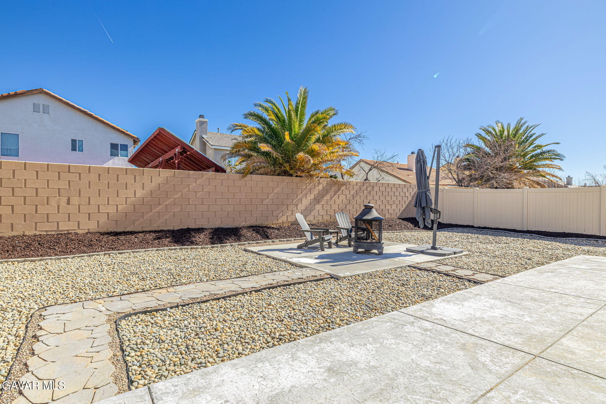 44302 Marbella Street Lancaster, CA 93536 - Photo 11 of 38 a view of a house with a yard and sitting area