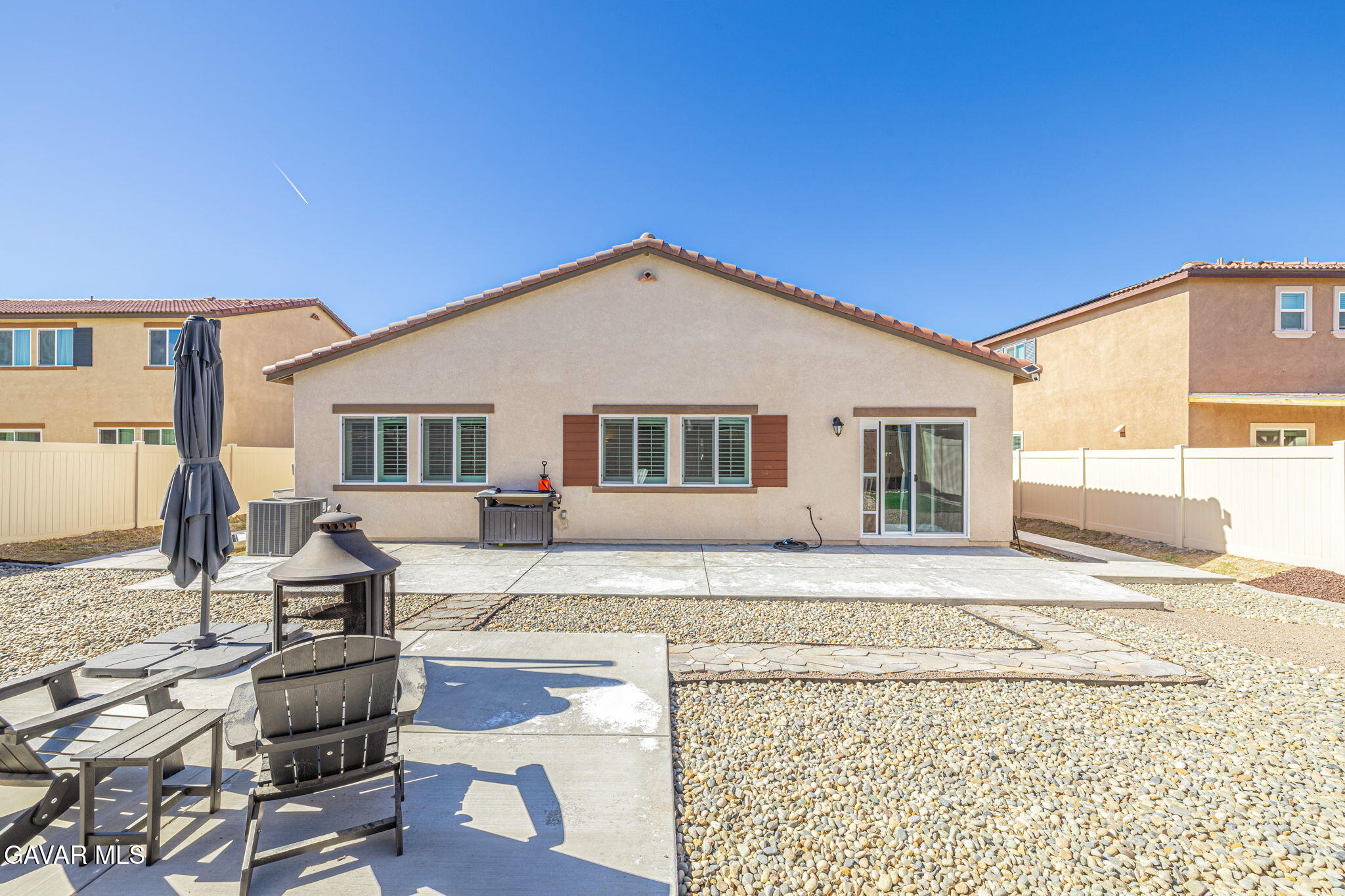 44302 Marbella Street Lancaster, CA 93536 - Photo 12 of 38 a front view of a house with a yard