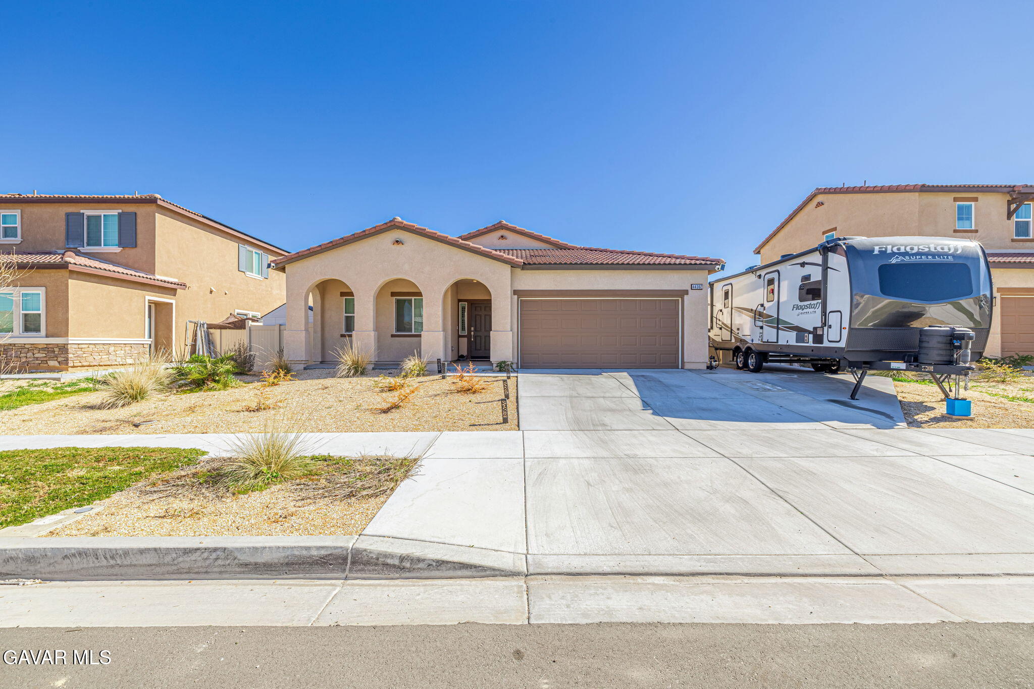 44302 Marbella Street Lancaster, CA 93536 - Photo 15 of 38 a view of a house with a outdoor space