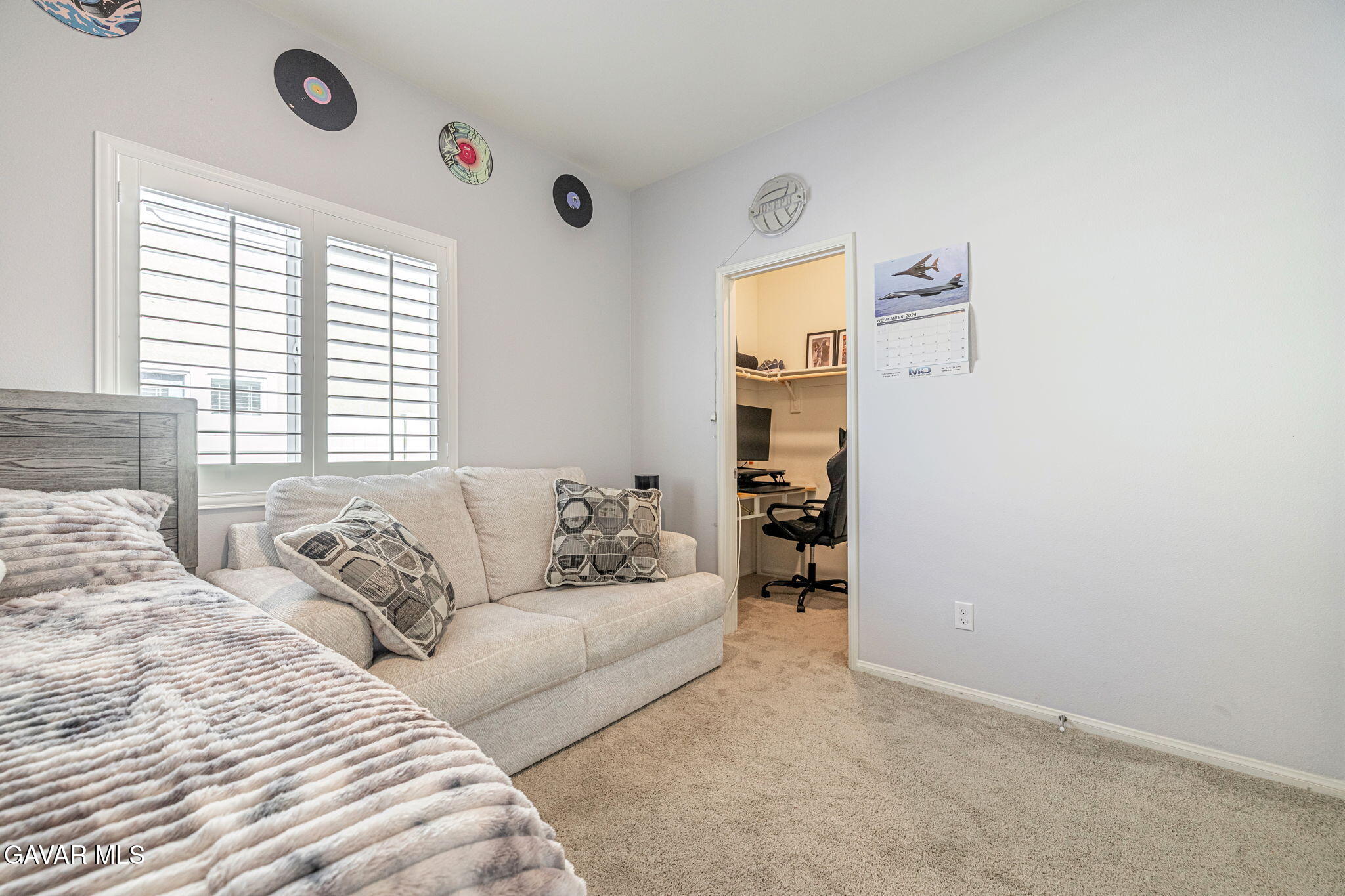 44302 Marbella Street Lancaster, CA 93536 - Photo 24 of 38 a living room with furniture and a window