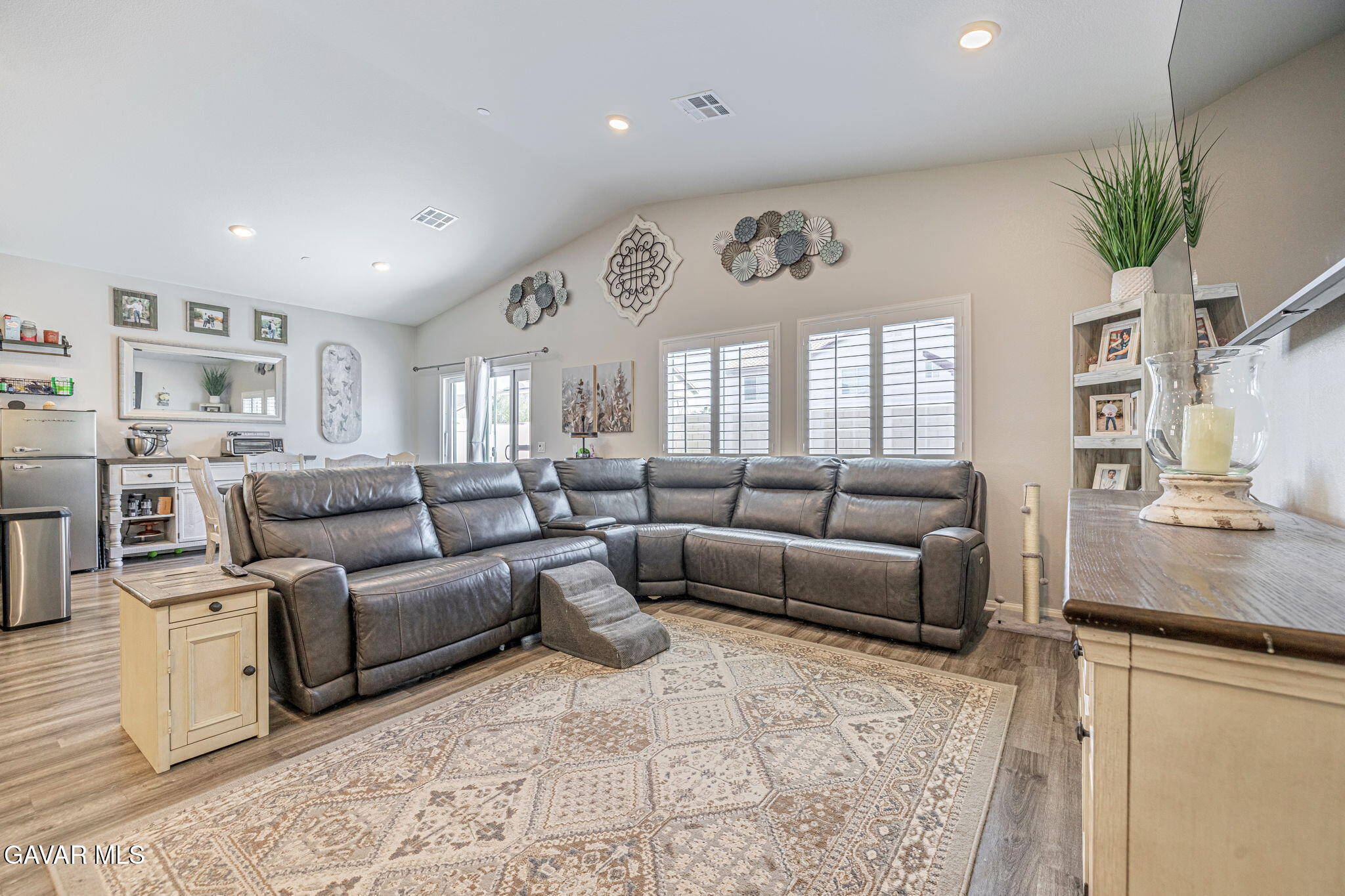 44302 Marbella Street Lancaster, CA 93536 - Photo 3 of 38 a living room with furniture and a large window