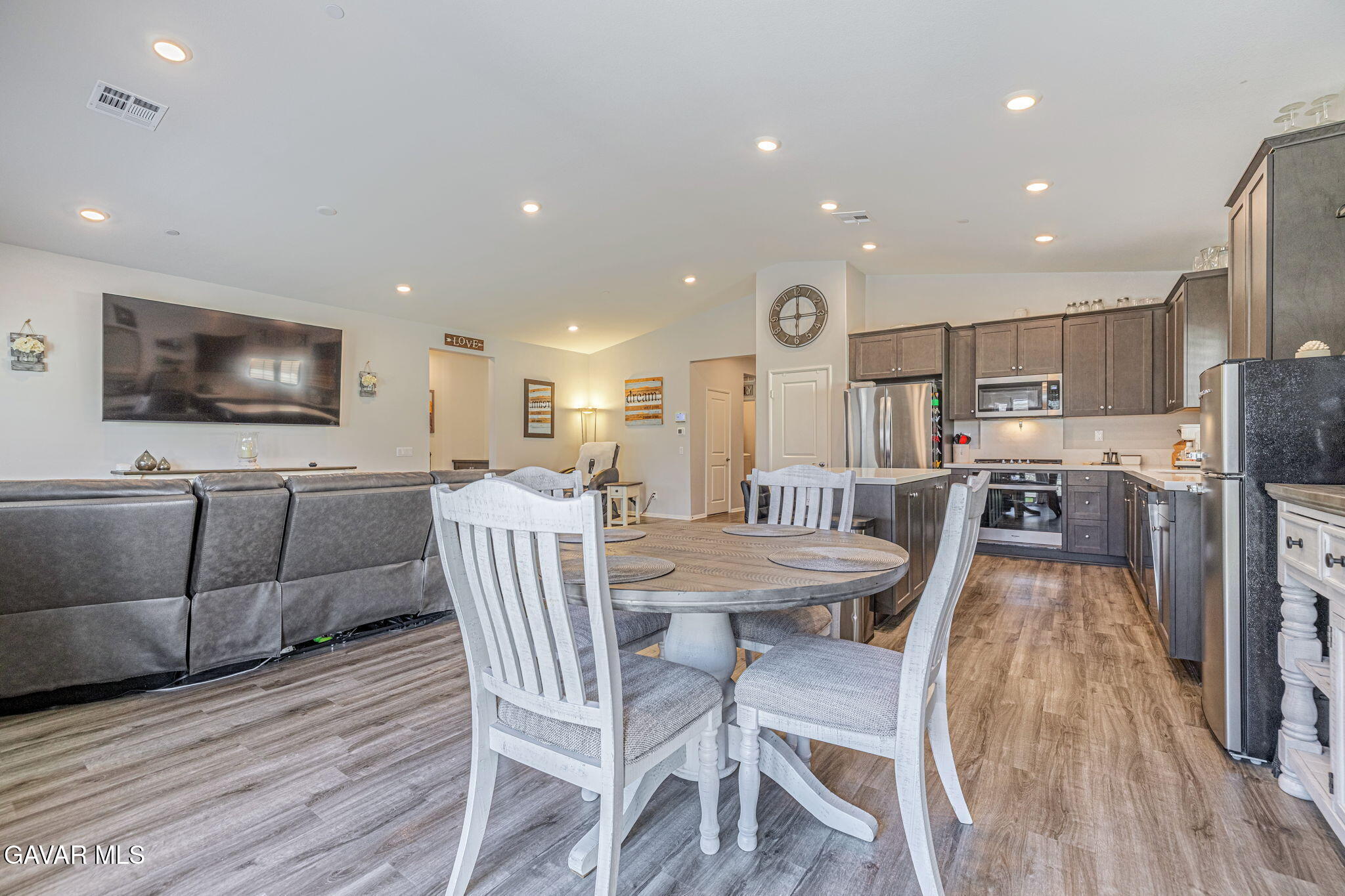44302 Marbella Street Lancaster, CA 93536 - Photo 33 of 38 a view of a dining room with furniture