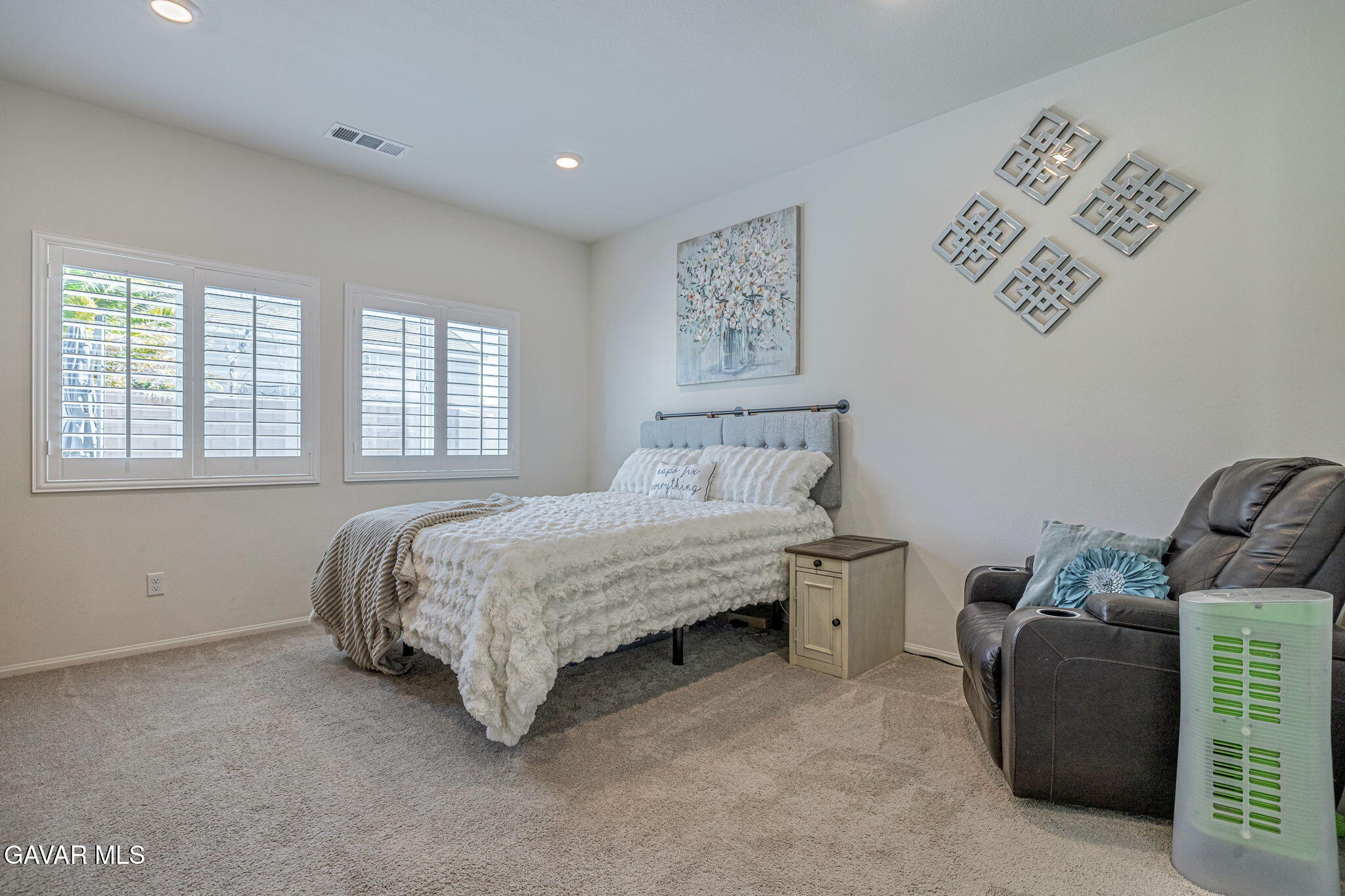 44302 Marbella Street Lancaster, CA 93536 - Photo 35 of 38 a bedroom with a bed and a window