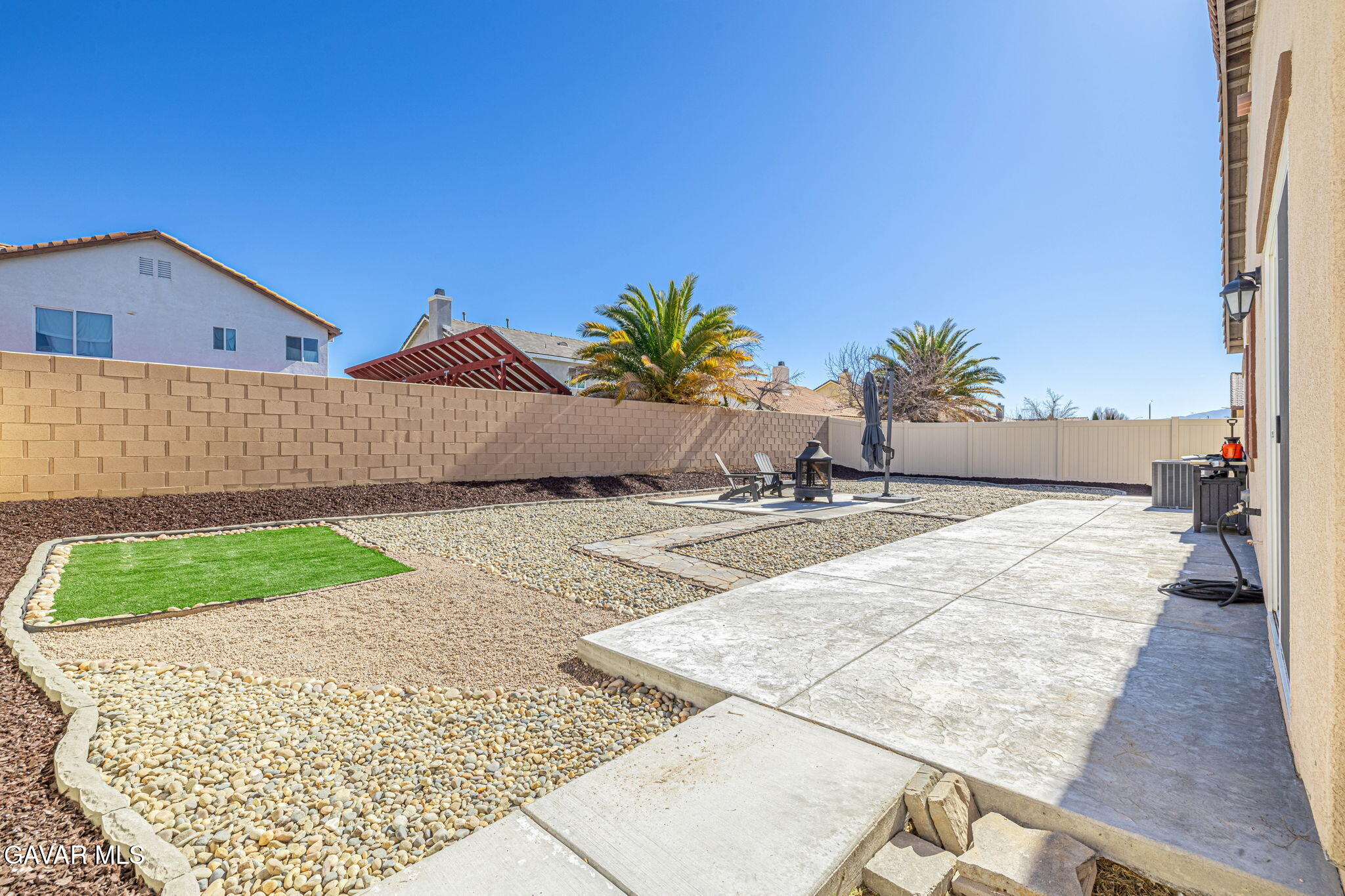 44302 Marbella Street Lancaster, CA 93536 - Photo 9 of 38 a view of a house with a yard