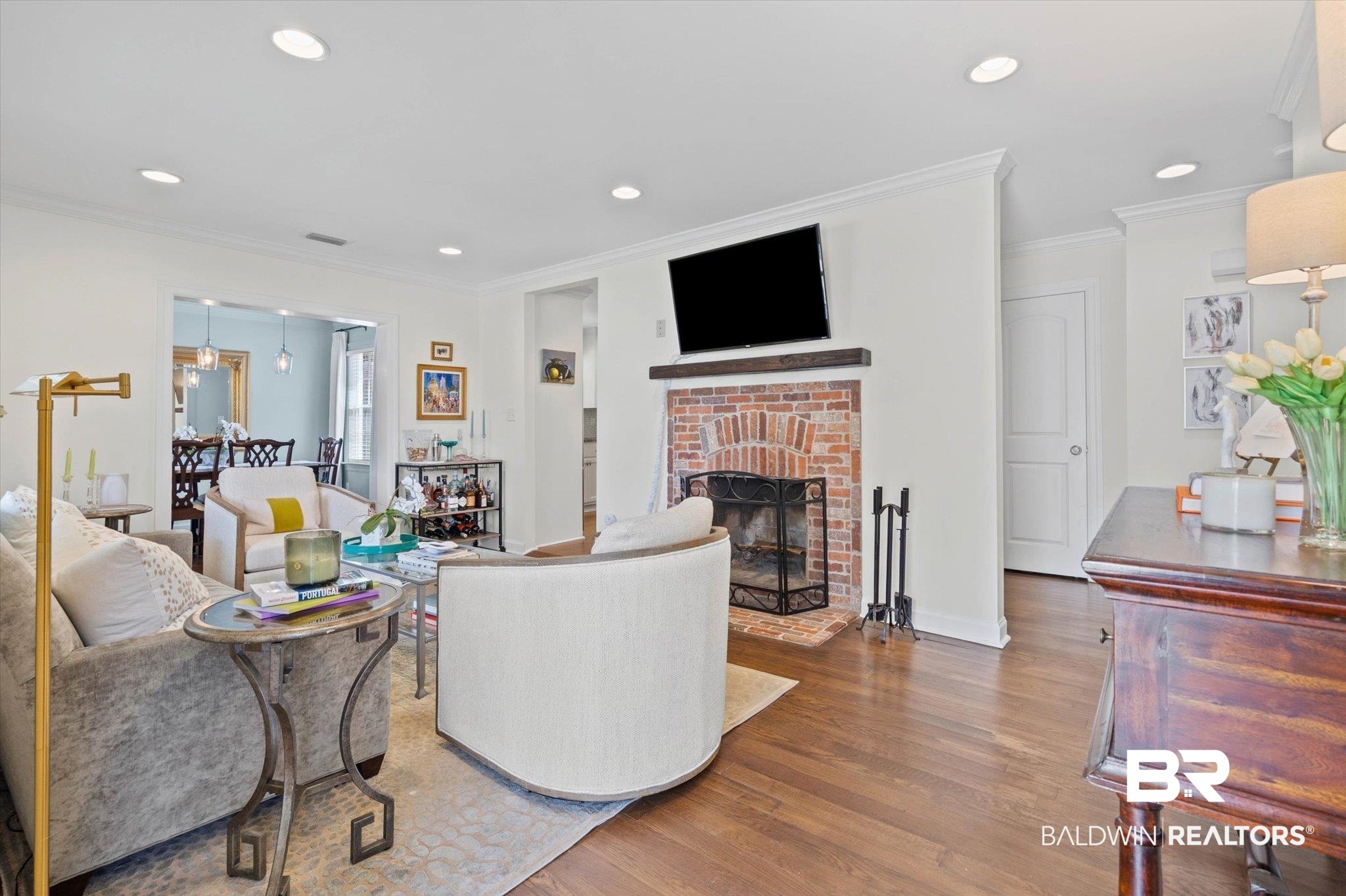 77 North Hathaway Road Mobile, AL 36608 - Photo 6 of 33 Living room featuring crown molding, recessed lighting, wood finished floors, and a fireplace