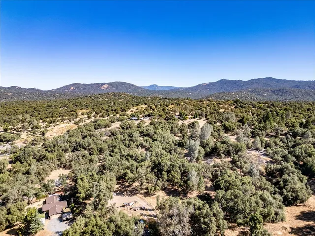 a view of a city with mountain